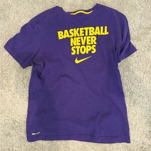 Nike Basketball. Ever Stops Purple and Yellow Basketball Tee